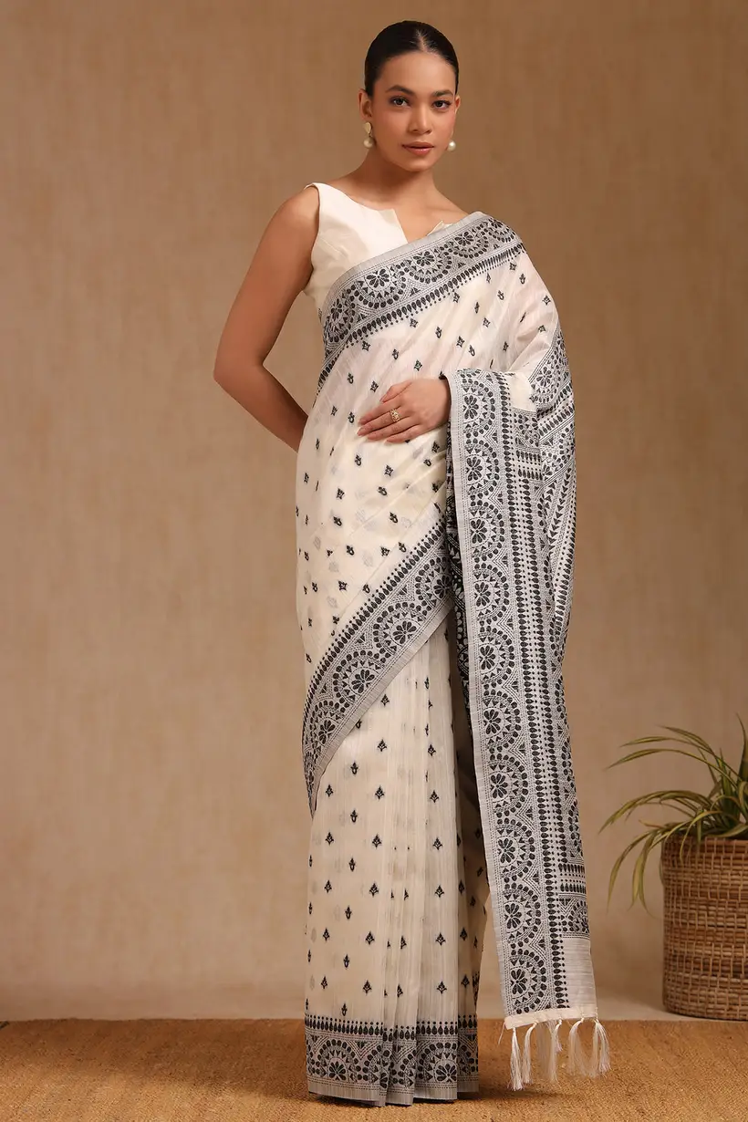 off white and black tussar woven design saree